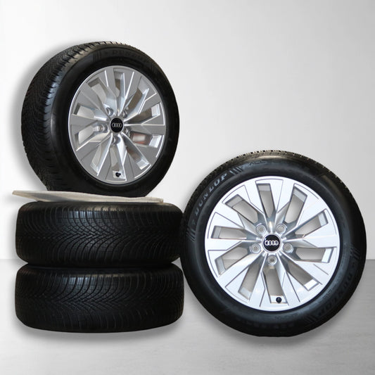 Twee Audi velgen met all-season banden, zilverkleurig spaakdesign