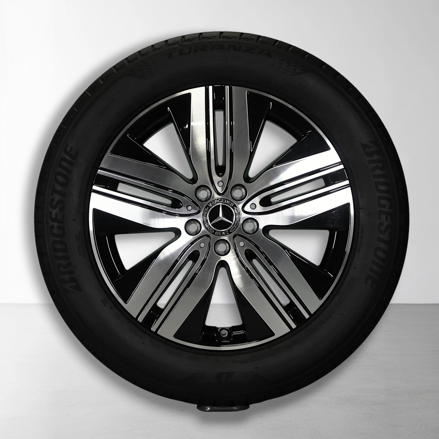 18 inch lichtmetalen velg met zomerband: glanzend zwart-zilver multi-spaak
